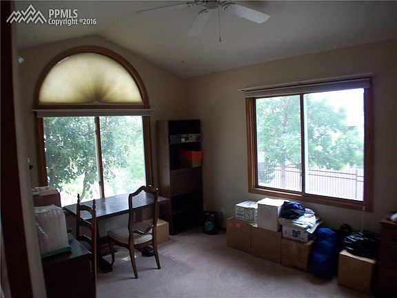 Front bedroom features half round rampart window plus exposure on two sides.  Th