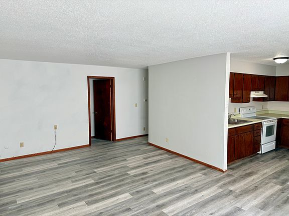living room an open floor plan to kitchen