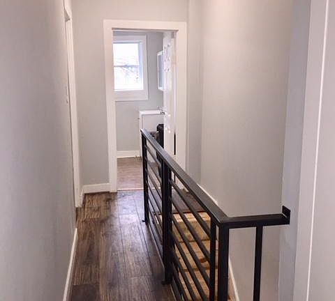 Second floor hallway facing bathroom