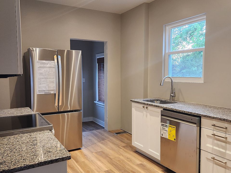 Brand new kitchen includes granite countertops, new appliances. French door fridge with ice maker.