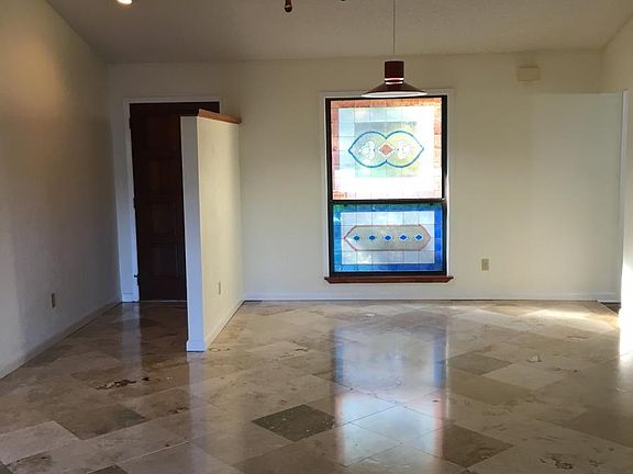 stained glass accents dining area, while providing light and