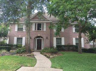 5830 Woodland Falls Dr, Kingwood, TX 77345