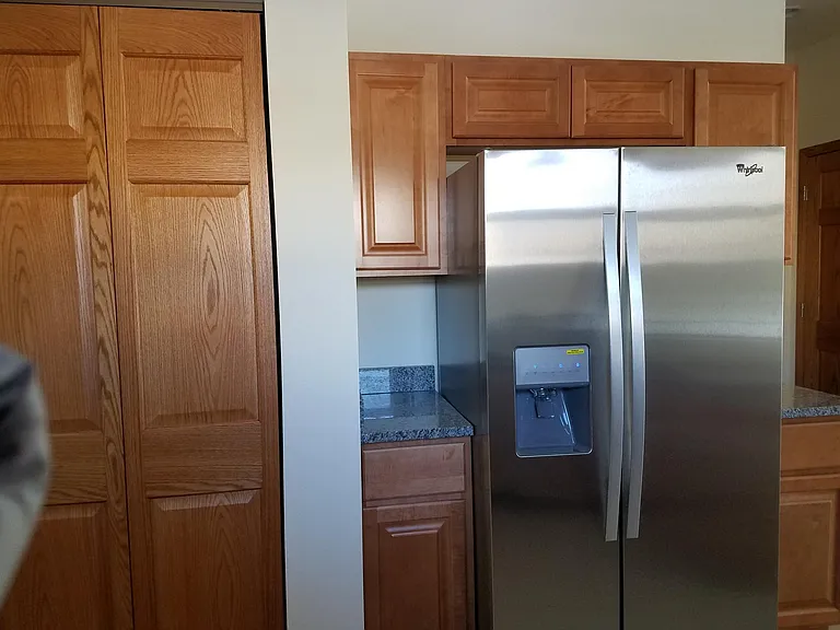 Along With Side by Side Refrigerator With Ice Maker & Water Dispenser.
