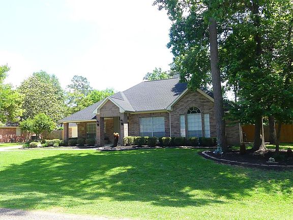 Meticulously maintained one-story on oversized lot.