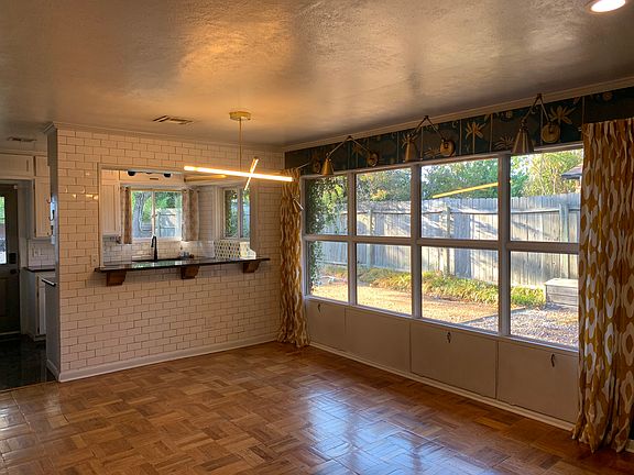 Kitchen opens up to dining/ living area.