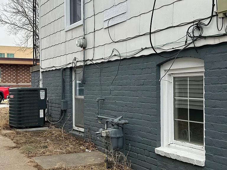 Sidewalk and side of property.