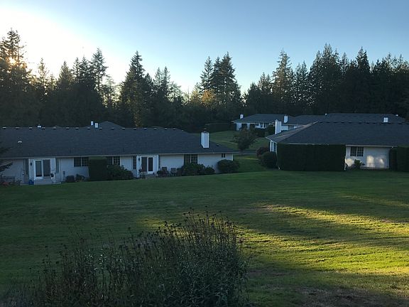 Enjoy ample green space between units in a park-like setting