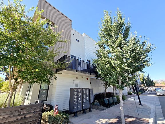 Exterior balcony with mountain views, and side privacy with trees