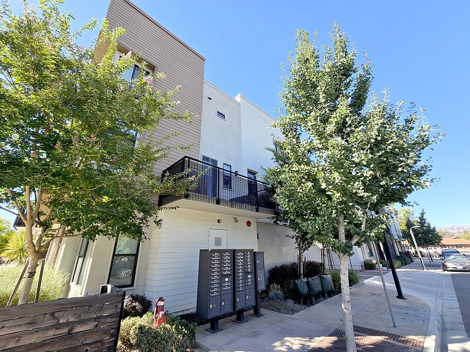 Exterior balcony with mountain views, and side privacy with trees