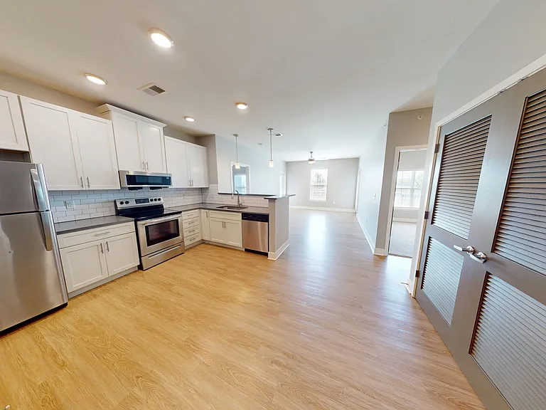 The Pleasant is a two-bedroom, two-bathroom apartment with an open layout. The Pleasant is a two-bedroom, two-bathroom apartment with an open layout.