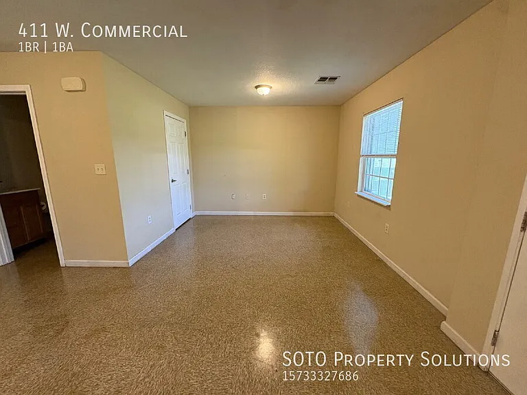 411 W Commercial St — Photo 2