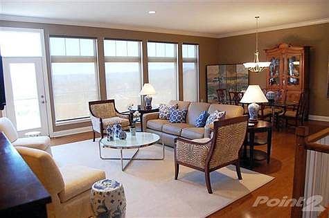 <b><EM>RICH HARDWOOD FLOORS!</EM></b> Upgraded 5" hardwood flows throughout the main level, while the entertainment areas are blanketed in natural light from the full-view windows! All windows across the rear of all three levels provide spectacular skyline views!
