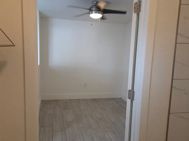 Bathroom door facing bedroom
