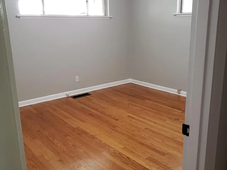 Bedrooms have hardwood floors, plenty of light, HVAC and cable ready!