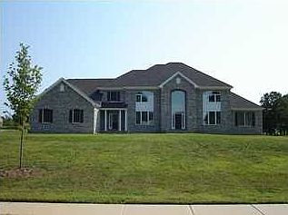 Stately and Elegant Describes This Center Hall Colonial with Conservatory!