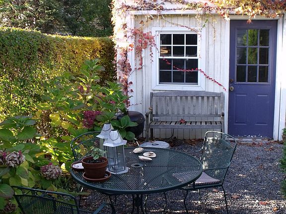 There are two beautiful outdoor seating area. This is one