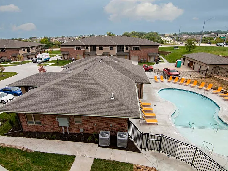 Our west clubhouse offers residents a second resort-style pool, hot tub, outdoor firepit and more.