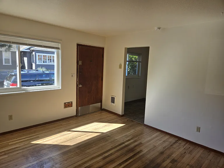 Living area showing doorway to dining space.