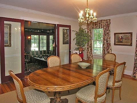 15 X 17 formal dining room opens to pub room