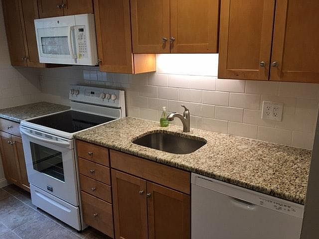 Maple Cabinets, new dishwasher, range and microwave