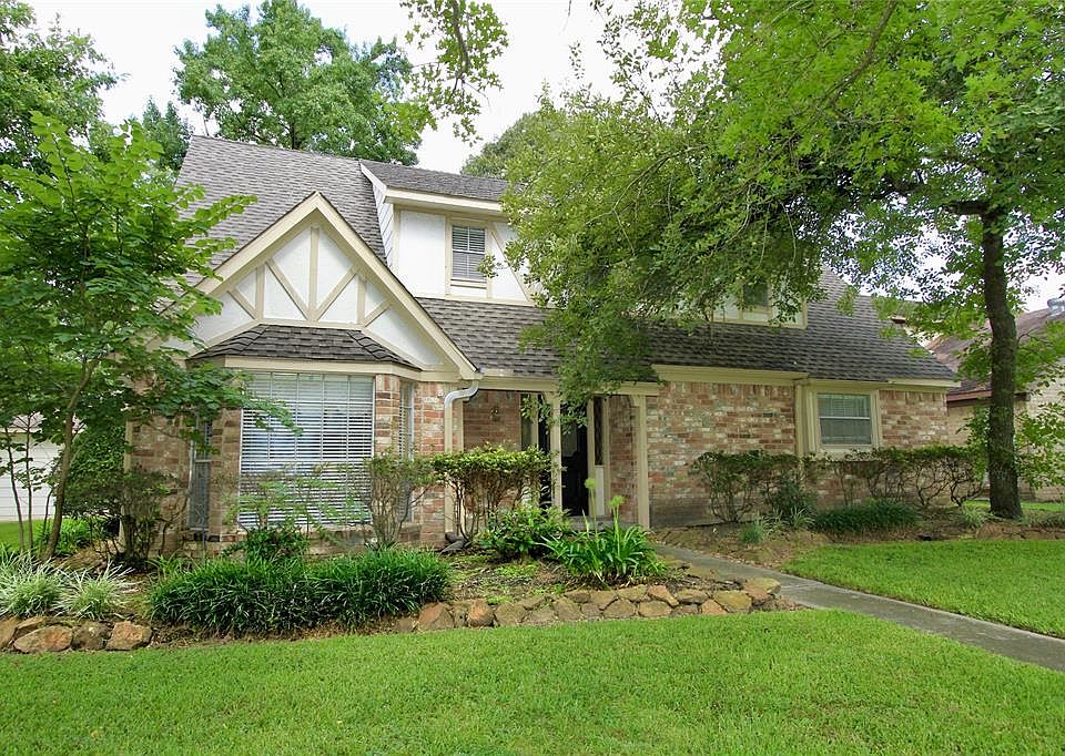 Charming Two Story, Four Bedroom Home offers two living areas on the main level for versatility ~ Great Back Yard with a Covered Porch and Paver Patio.