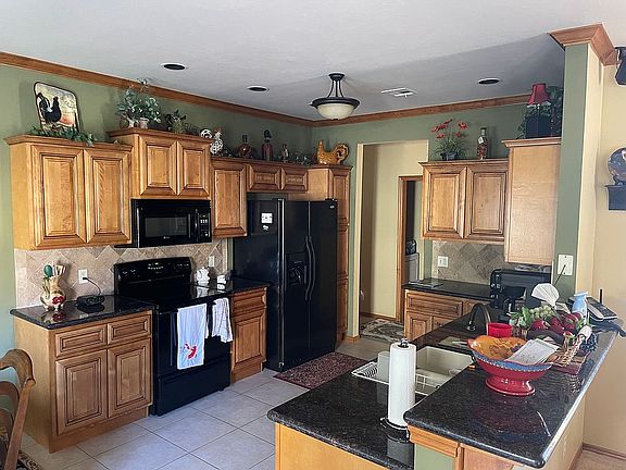 5th image of 12600 N Rockwell Ave Unit 32