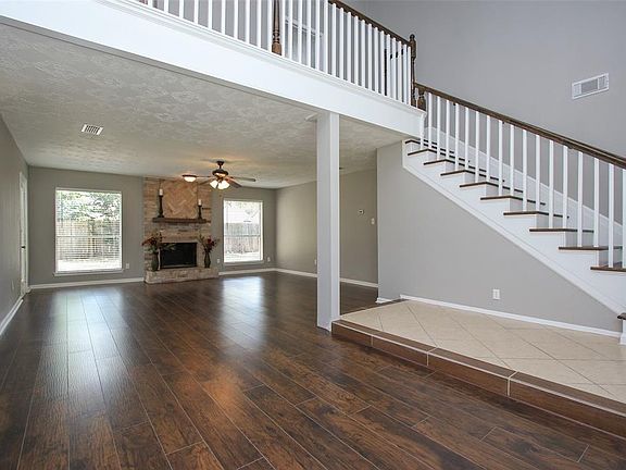 View of this amazing den from formal dining area.
