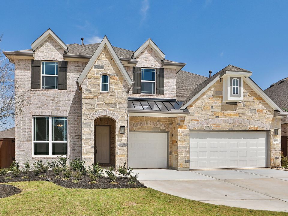 Luxurious stone facade and triple garage epitomize elegance in Dartmouth at Brookewater s prestigiou
