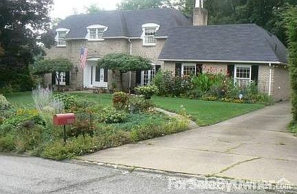 Original Owners - Solid Brick!
						:
						Brick front walk, flat driveway with turn around and back entrance to garage.