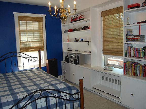 Bedroom #3 with built-in bookshelves