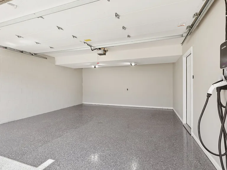 Two Car Garage - Finished Garage, Epoxy Flooring, Electric Charging Unit, Additional Lighting