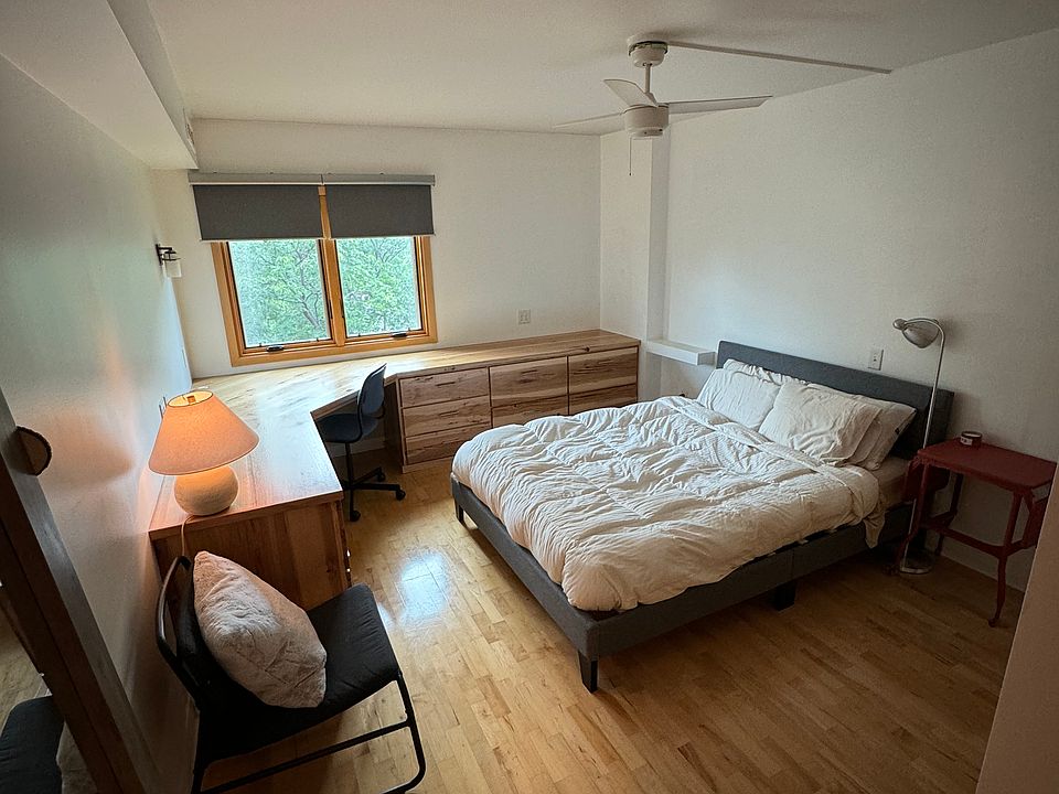 Bedroom has a beautiful custom work station.