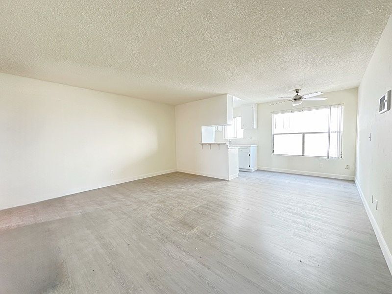 Bright open floor plan features Laminated Vinyl Plank Flooring!