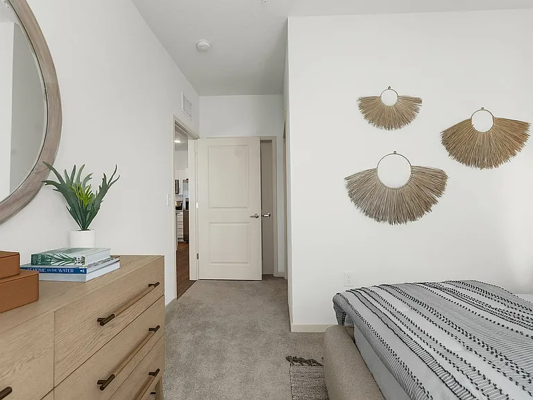 Experience the serene beauty of this elegantly decorated bedroom corner.