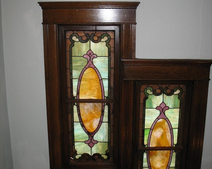 windows in stairwell leading to apartment