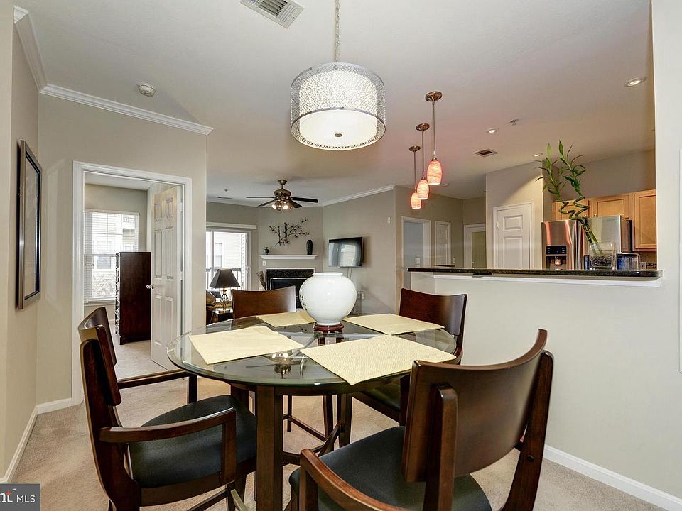 Welcoming Sleek Modern 3rd floor condo with an open floor plan in the Gated community with a Clubhouse, outdoor swimming pool, fitness, and all other excellent amenities of Stonegate at Faircrest.