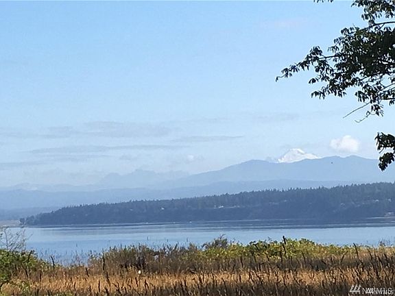 This is the view of the mainland from this home site. You will enjoy the twinkle of city lights in the distance and the enchanting reflection of the moon on the water after sunset. Ahhhhh.....