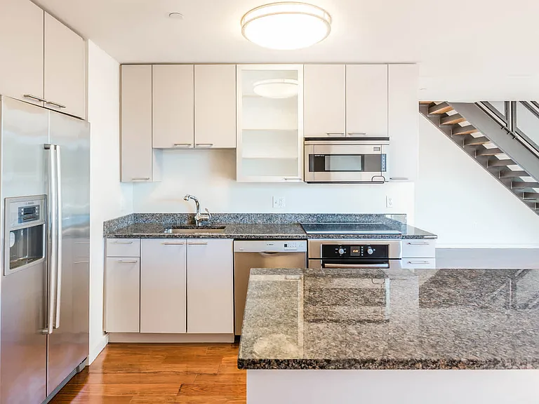 Kitchen with Stainless Steel Appliances and Granite Counters