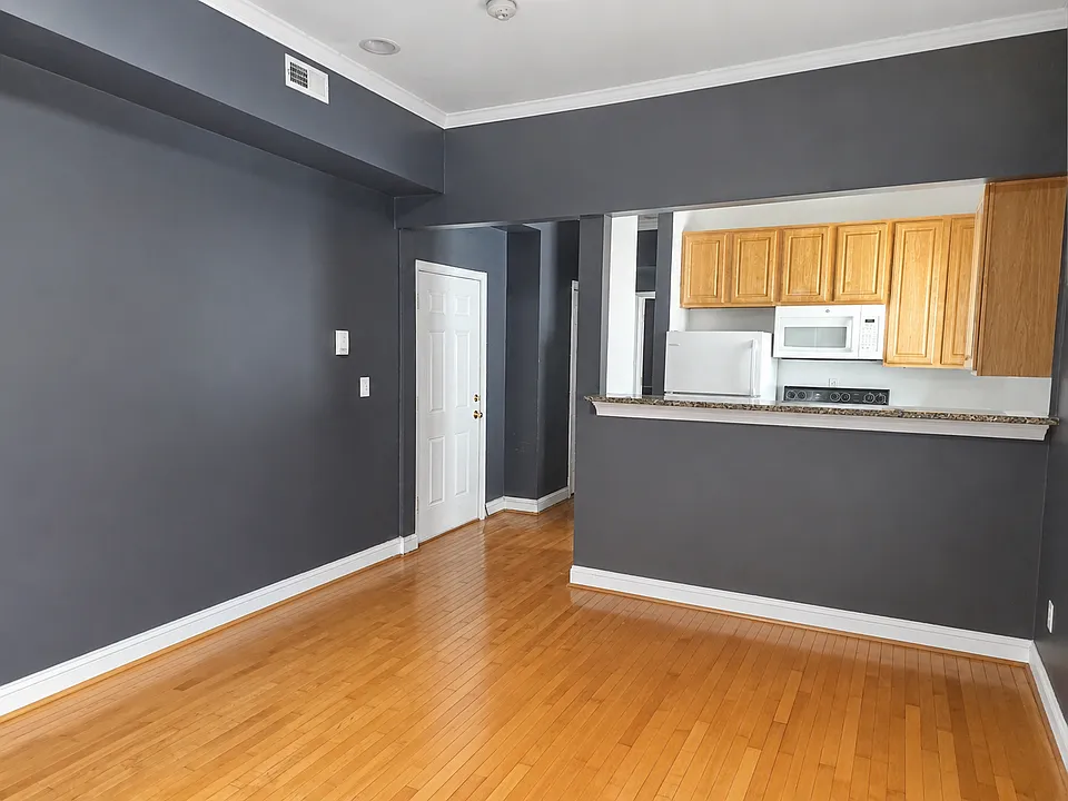 Living room dining combo and breakfast nook with bar style seating