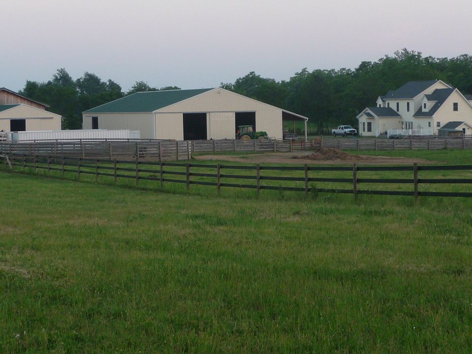 Side View of House, Barns and Arena