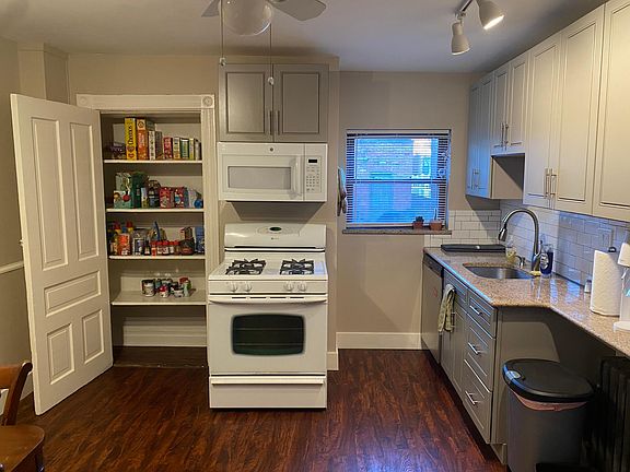 Built in Food pantry. Stove, Built-in microwave, & Dishwasher included.
