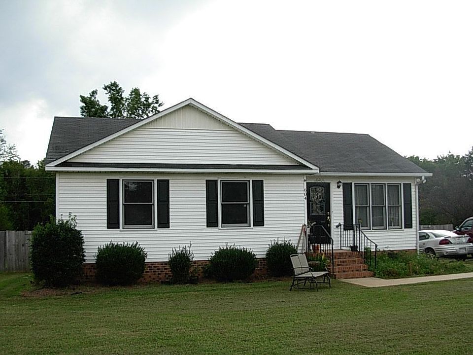 Clean and cozy, maintanence free exterior on almost 1/2 acre!!!