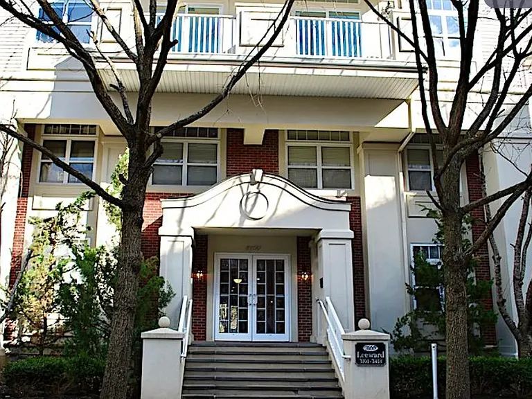 Building entrance, with private parking spot nearby