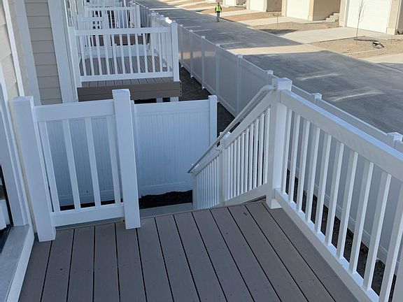 Similar to back deck. (There is green space behind this town home.)