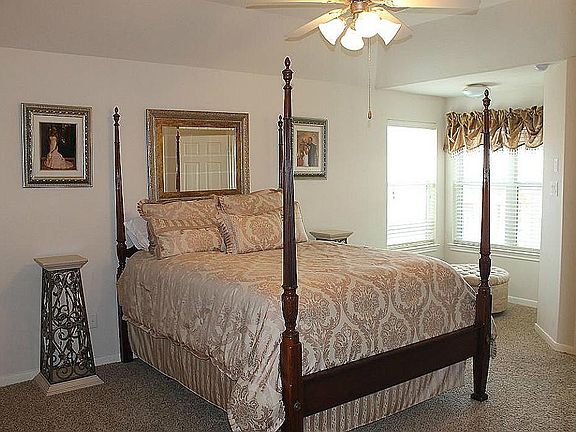 Large Master bedroom with sitting area .  Master Bath off of Bedroom