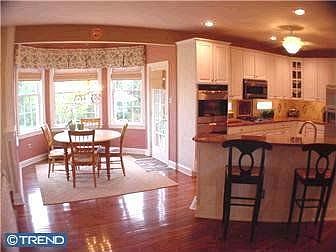 Kitchen with Granite Countertops, Dacor double oven and Dacor cooktop
