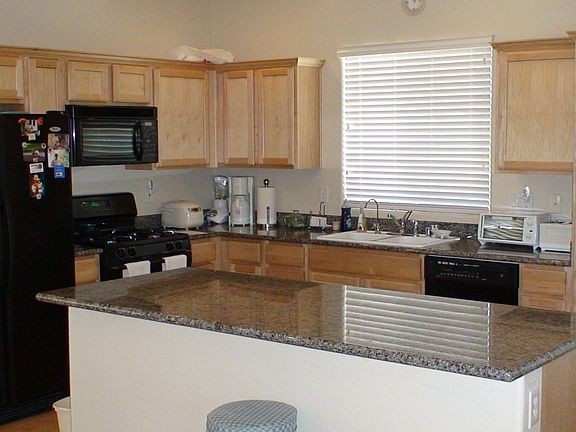 Granite Counters, Maple Cabinetry