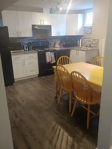 7619 135a Ave NW #1A photo 1