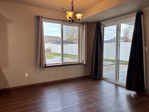 4th image of 8811 N Elm St