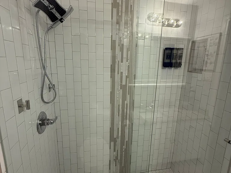Full Bathroom 1 - walk-in shower and bathroom essentials.